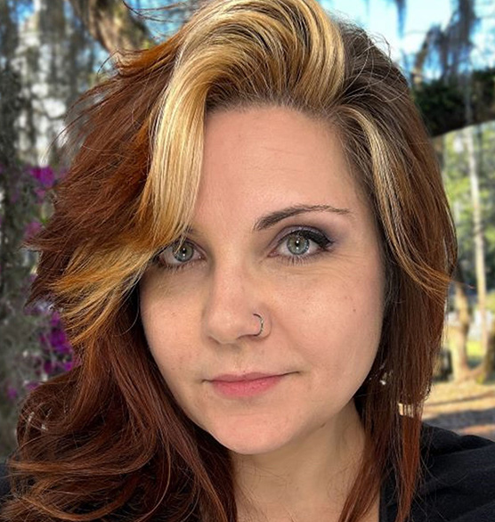liz headshot red